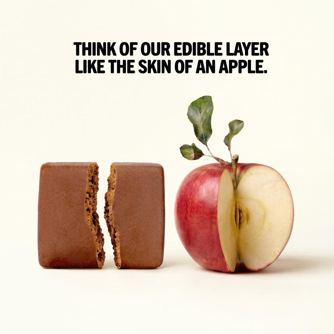 Dark Chocolate & Blood Orange Protein² bar next to an apple – its beeswax coating works like an apple's skin, no plastic wrapper